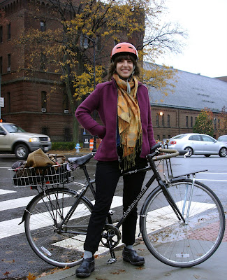 autumn cyclist purple orange gold Boston rain