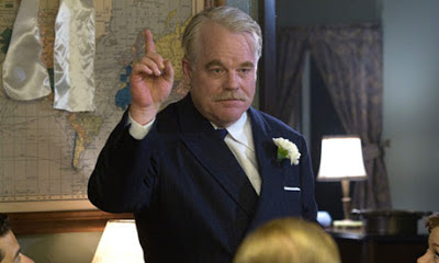 Philip Seymour Hoffman as Lancaster Dodd in The Master, delivering a speech, directed by Paul Thomas Anderson