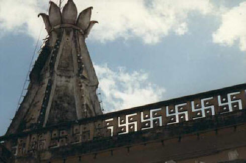 Hindu temple in Tanzania with swastika designs on architecture.