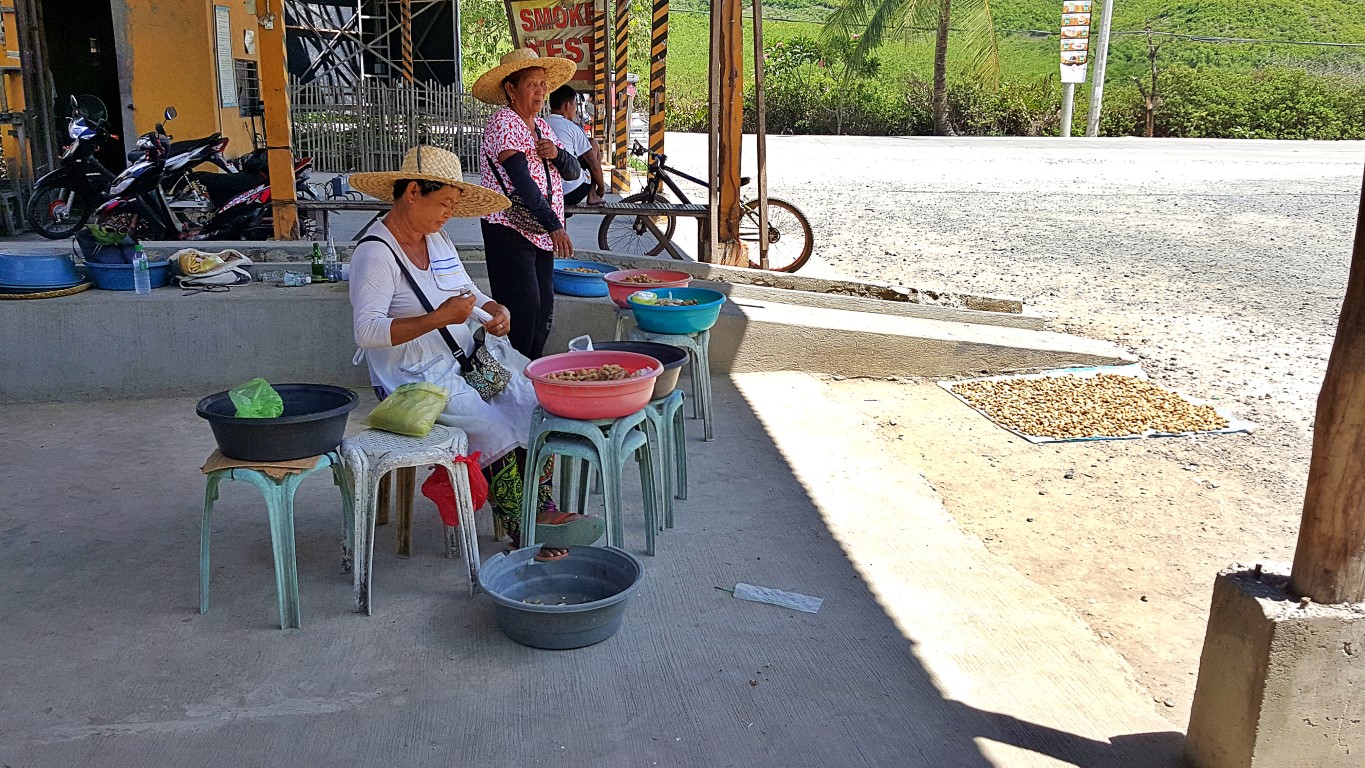 peanut vendors at the "bastap", a meal stop in Carmen, Cebu