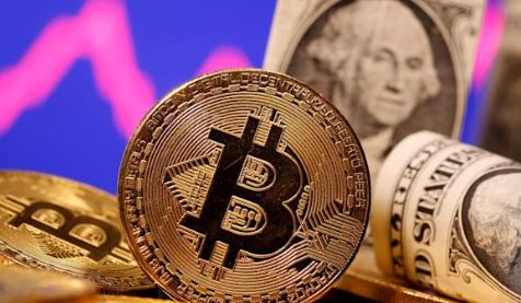 Bitcoin soars to top $50,000 for the first time