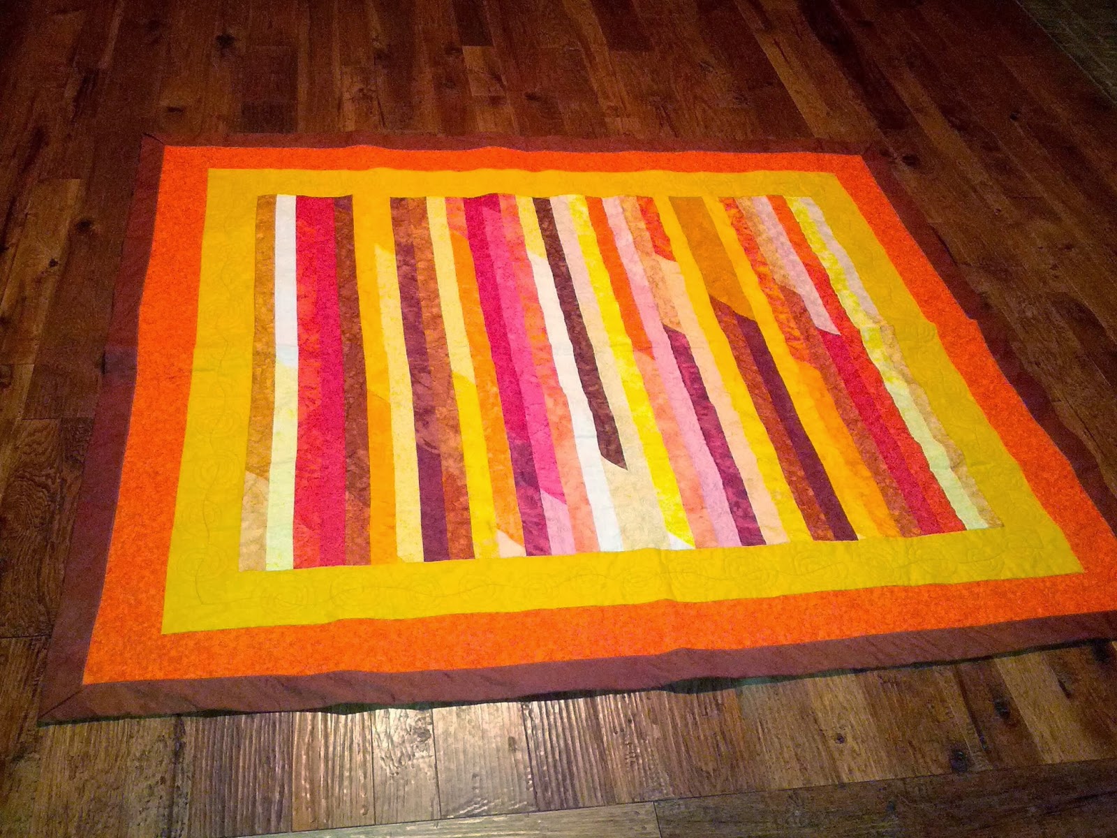 http://www.quiltparadigm.blogspot.com/2014/01/my-favorite-to-date-qayg.html