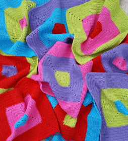 Looking for a bright bold colour block crochet design?  Click to see more of this colourful crochet blanket as it takes shape!