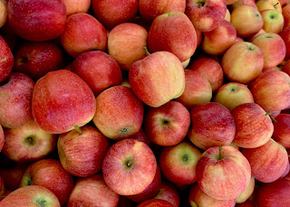 Close up of a pile of red and green apples