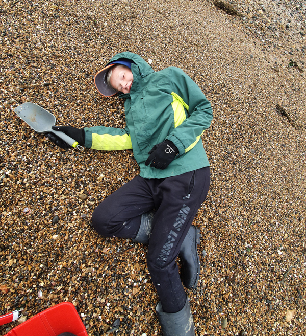 Fossil hunting at 8am for the low tide with a tired boy