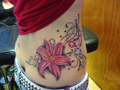 Flower tattoo with tribal and stars tattoo design pictures