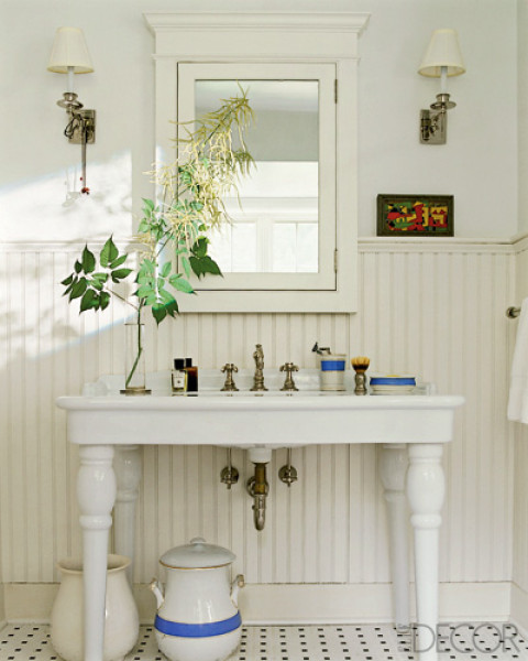 dark kitchen shelves with light countertops