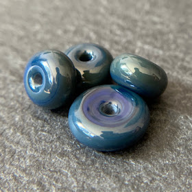 Handmade lampwork glass beads by Laura Sparling made with CiM Montezuma