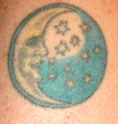 Sun & Moon tattoo. The banded tattoo below the Celtic piece is a series of