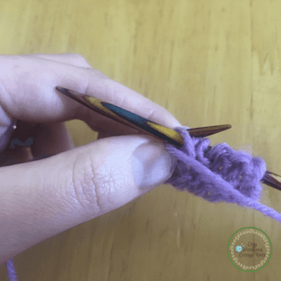 Picture of yarn around knitting needle