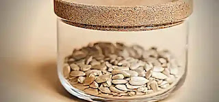 The Nourishing Power of Sesame for Skin Health Sesame kernels in a glass container Sesame