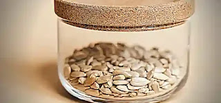 Sesame kernels in a glass container Sesame