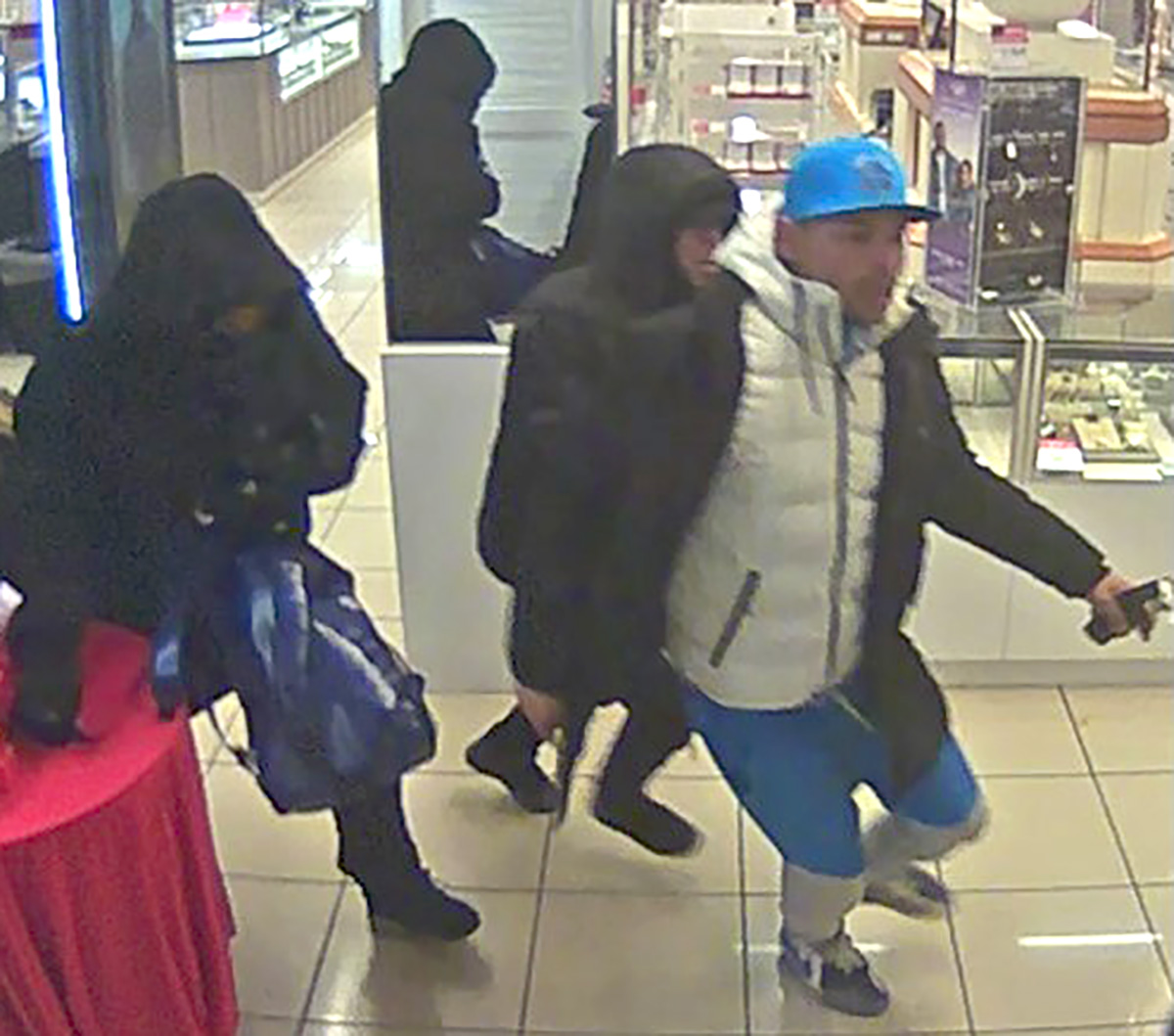 The NYPD is searching for members of a flash mob that stole tens of thousands of dollars worth of sunglasses at a Queens Mall. -Photo by NYPD