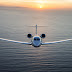 Gulfstream G650 Business Jet Cruising on Sunset Scene