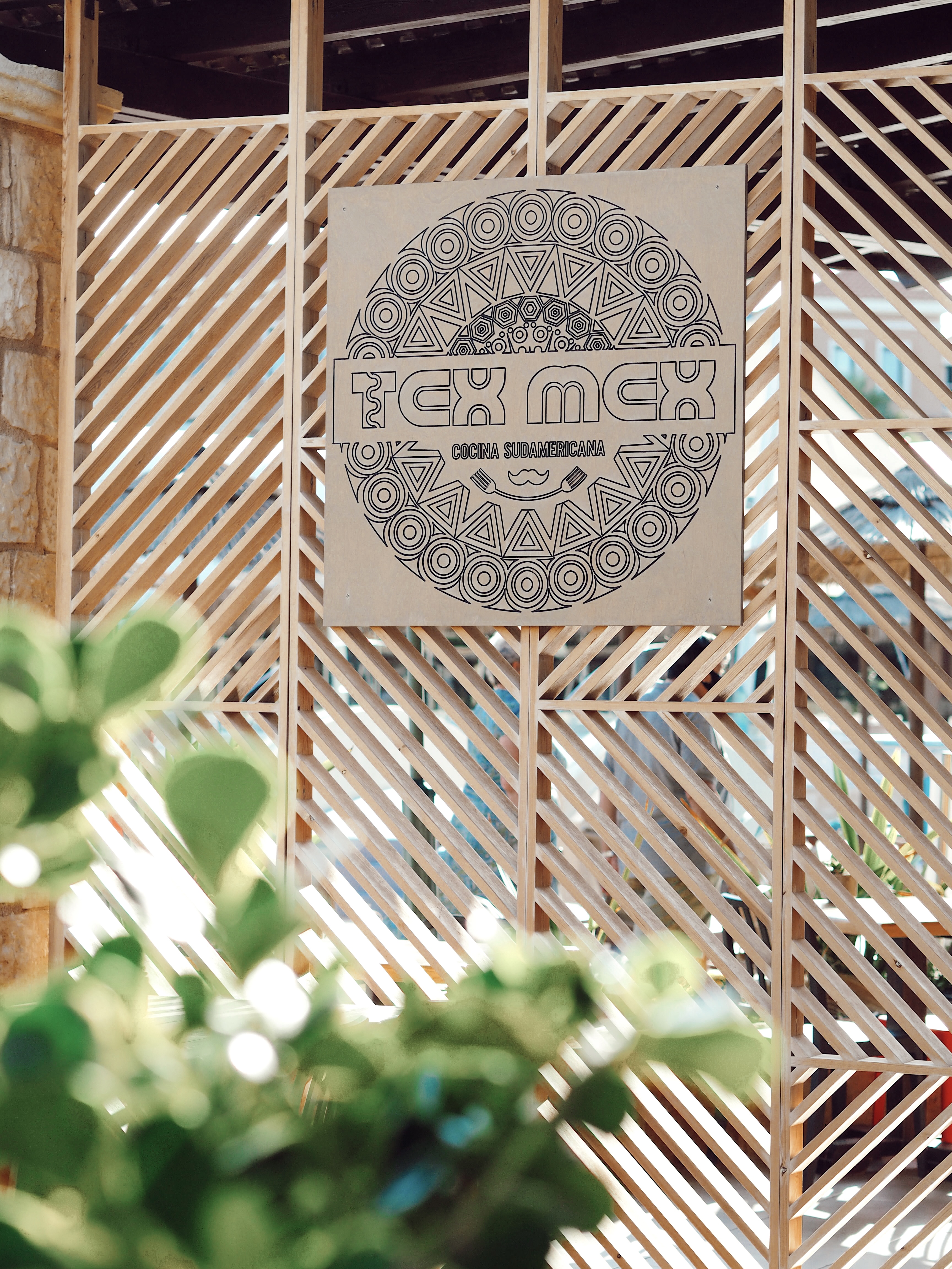 A sign reading 'Tex Mex' at one of the restaurants at the Atlantica Caldera Palace in Crete, Greece.