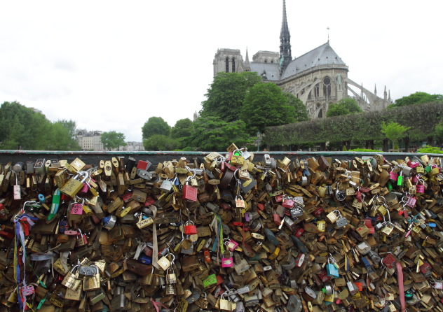 The locks of lovers and Notre Dame Cathedral, Paris