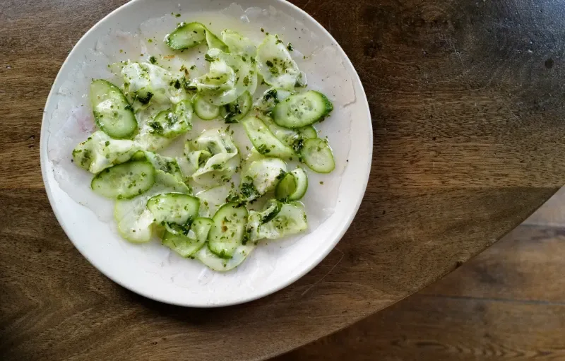 Snapper carpaccio, heirloom cucumbers, lemon, lemon myrtle