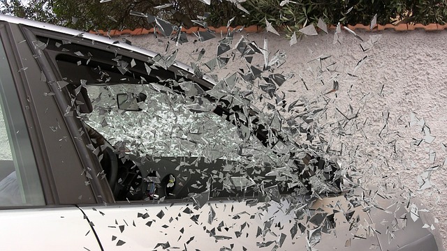 Side Window of Car is Shattering Into Hundreds of Broken Pieces of Glass