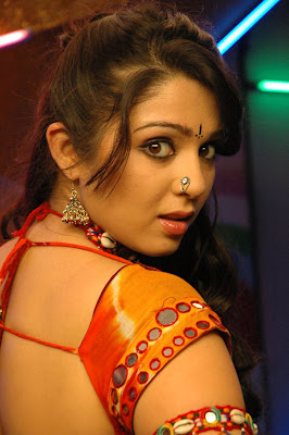 Telugu Actress Charmi Spicy Stills in Red Saree
