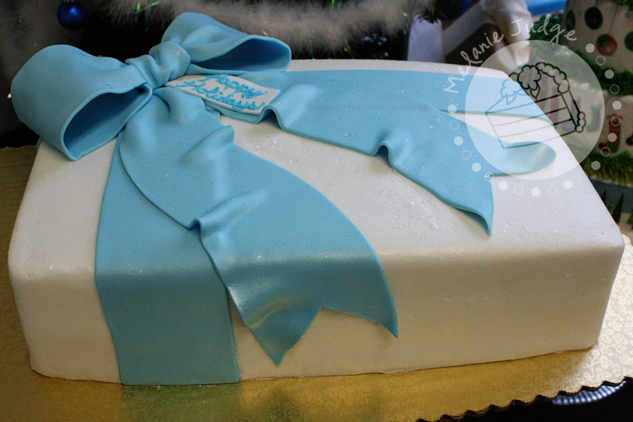 It's a simple buttercreamiced cake with a fondant bow