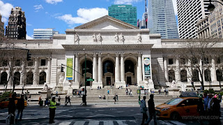 The new york public library is awe inspiring for its scope and brethe.
