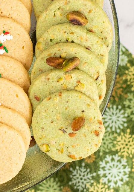 cookies lined up on a green platter.