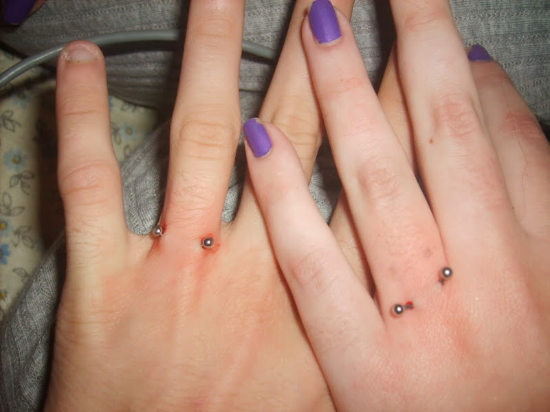 another piercing that many people get is a dermal anchor hand piercing  title=