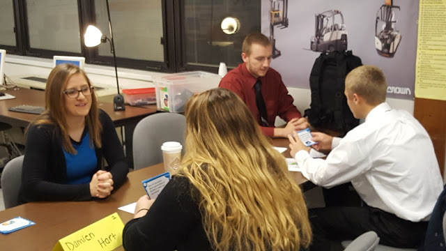 CBI students practicing with mock interviews.