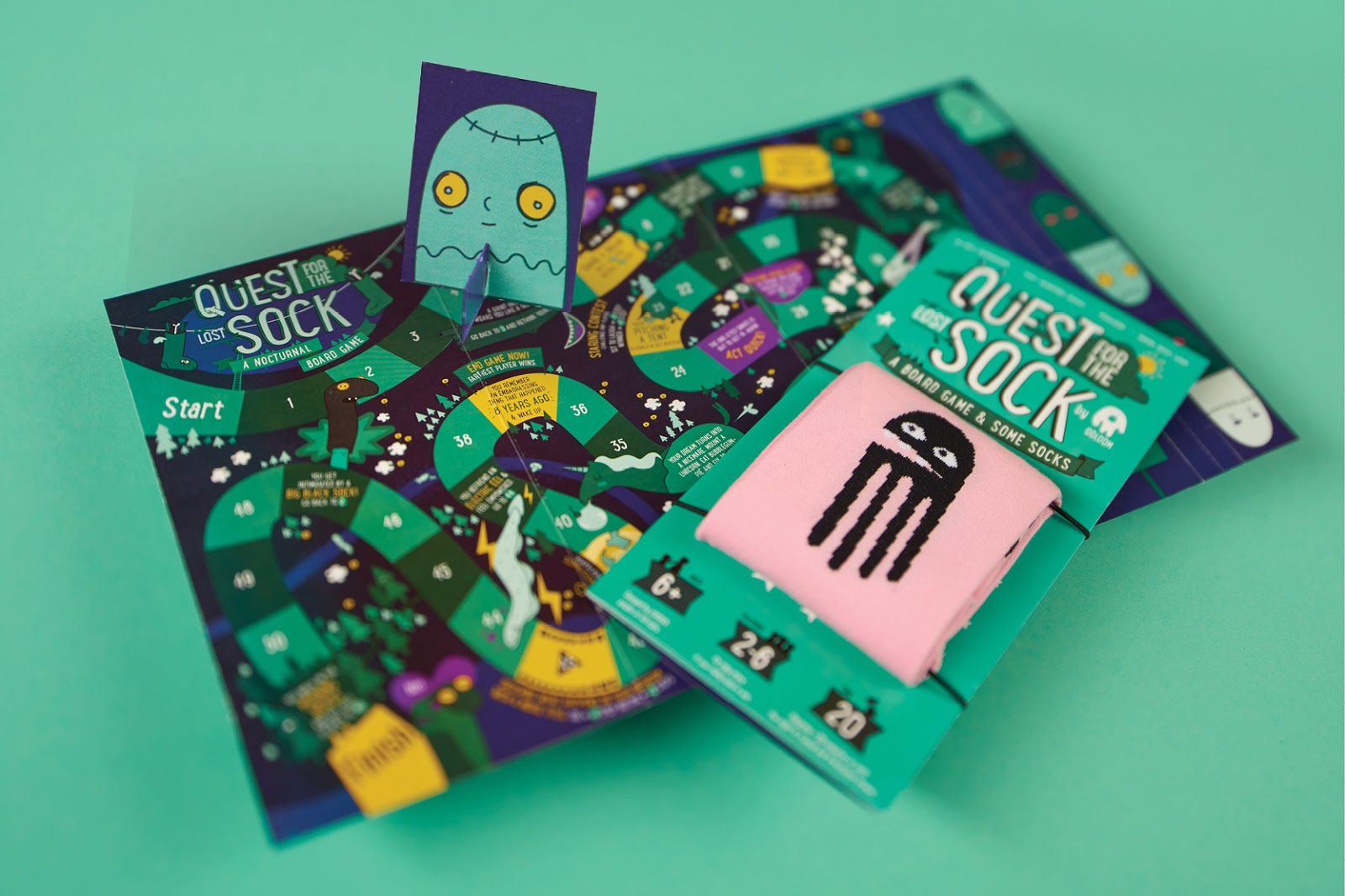 Download Ööloom Board Game And Sleeping Socks on Packaging of the ...