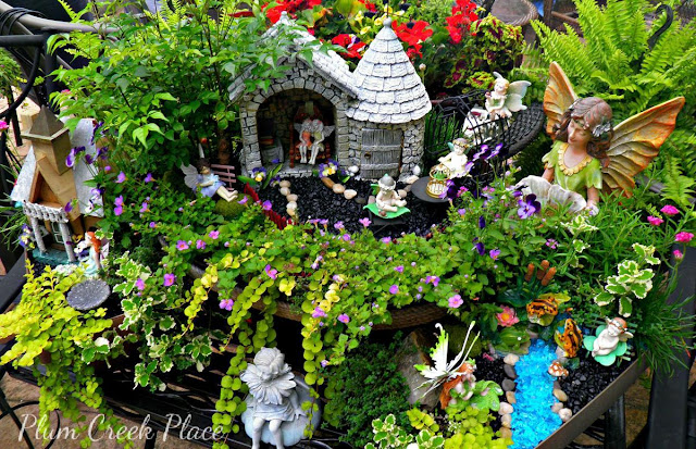 Fairy Garden 2015 made from thrift store finds.