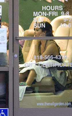 Ashley Tisdale getting a pedicure with a friend at a Los Angeles nail salon