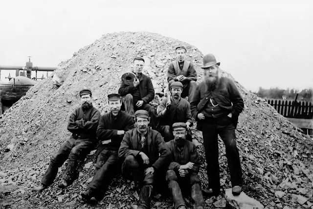 Workmen from Crowgarth Number 4 Pit, sat upon Slag