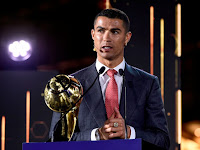Cristiano Ronaldo wins player of century award.