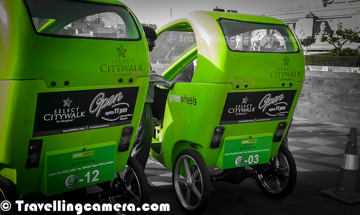 Recently Delhi's Chief Minister Sheila Dixit launched Green-Wheel Service at Saket. This is about running eco-friendly, battery powered & pollution free vehicles. Last weekend, I was at Select City Walk Mall of Saket and opted for Green-Wheel to reach Malviya Nagar Metro Station. Let's go through this Photo JOurney and know more about this lovely ride...As of now these are only launched in Saket and they run between Saket Malls & Malviya Nagar Metro Station. These Green-Wheels can be seen parked outisde Malviya Nagar Metro Station and Select City Walk Mall in Saket. They charge 20 Rs for one side and two people can sit at one point of time. Which means 10 rs per person, which is quite reasonable. Plan is to expand this service in other metro stations soon. Commuting from Malviya Nagar Metro to Saket Malls was one of the tedious thing. In fact, some time back when I went to Select City Walk via metro, I was surprised to know that Malviya Nagar Metro station is near as compared to Saket Station. Even the distance between Malviya Nagar and Saket malls is huge. So local transportation was one of the main pain point for folks commuting through Metro. G-Rik has solved this problem and hope that G-rik reach to other parts of Indian National Capital Region.These three-wheeler G-Riks were developed after extensive research and development by Green Wheels for over two years and has been fully customized to adapt to Indian conditions. Incidentally, Star Bus is the concessionaire for the first bus cluster launched in May 2011. At present, Delhi Metro runs feeder service as well on certain routes. This is besides the para-transit options like Gramin Sewa and autorickshaws. For more around this news, check out - http://articles.timesofindia.indiatimes.com/2012-04-28/delhi/31451728_1_bus-cluster-feeder-service-star-busThis photograph of Select City Walk Mall is clicked from G-Rik stand. It's located just at the exit of Parking. There is a counter on the corner from where one needs to take ticket for G-Rik ride. It takes around 7 minutes to reach Malviya Nagar Metro Station from Saket Malls. It seems that plan is to have around 5000 G-Riks in Delhi during next 15 months, which needs investment of around 100 crores.