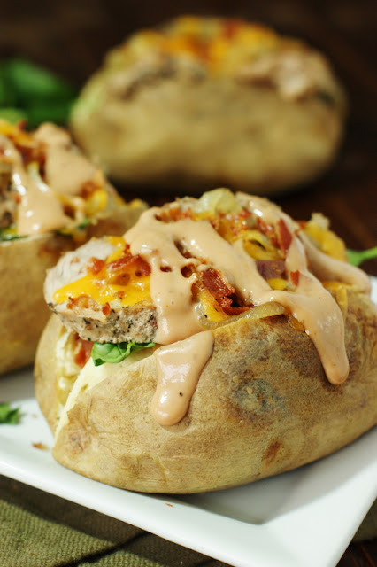 "Porkinator" Marinated Pork Loaded Baked Potatoes ~ a fabulously different & tasty way to enjoy pork tenderloin for dinner! #SmithfieldPork #ad  www.thekitchenismyplayground.com