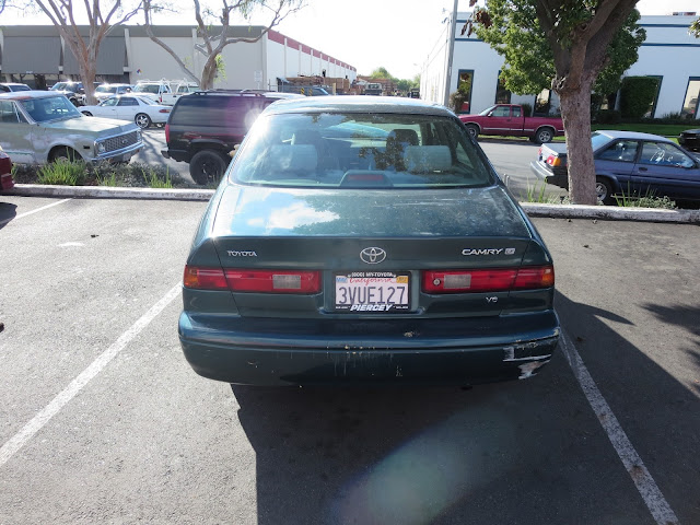 Scrapes on bumper on Camry before auto painting at Almost Everything Auto Body