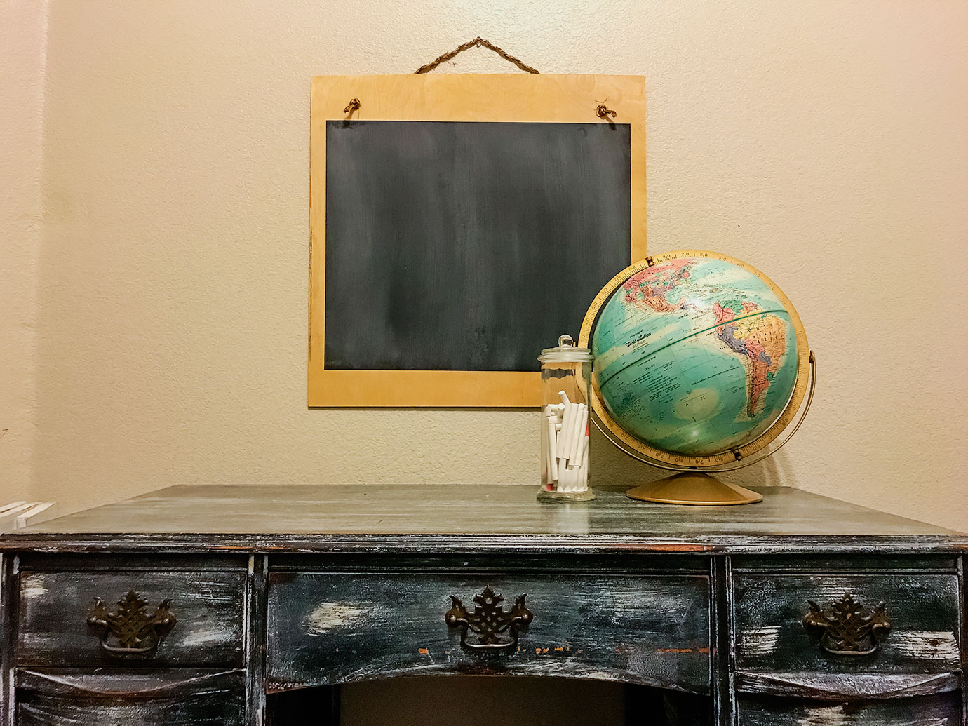 Easy DIY Chalkboard - Chalkboard with a Black Desk and Vintage Globe