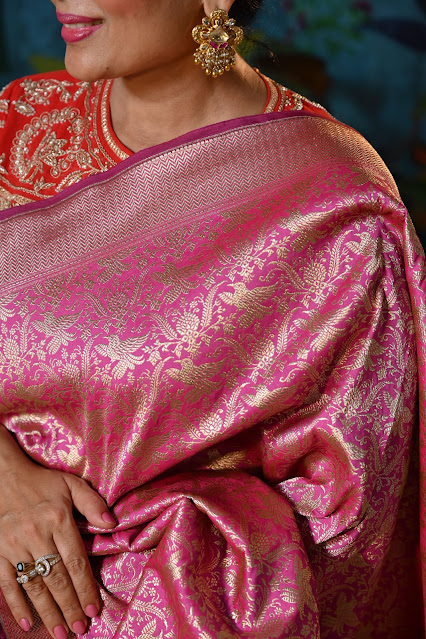 Pinkish lavender Banarasi  handloom saree with birds.