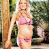 'Feeling sexy is a real challenge': Holly Madison bares her baby bump in a pink bikini... but says she's still getting used to her new shape  