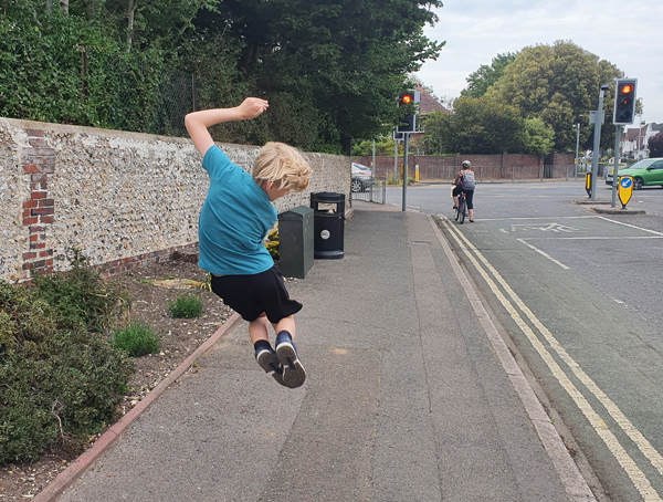 My 9-year-old jumping for joy on the way to school