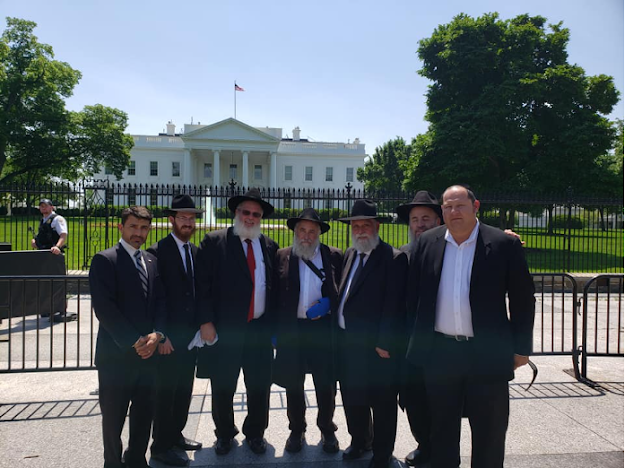 Contingent of Chabad rabbis at the White House. Rabbi Yeruchem Eilfort is third from left