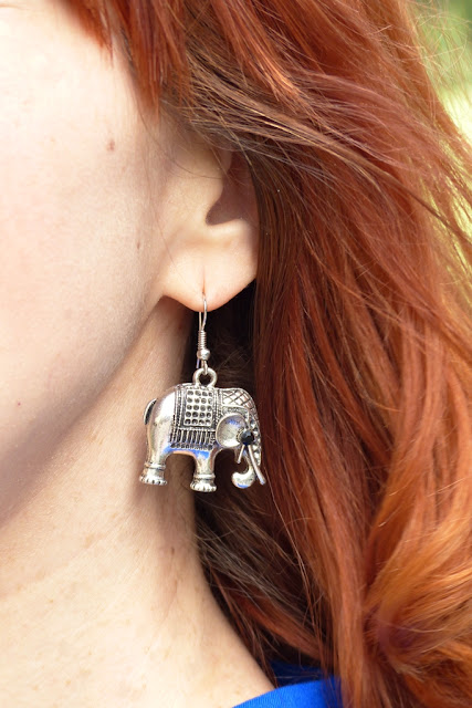 White metal elephant earrings 