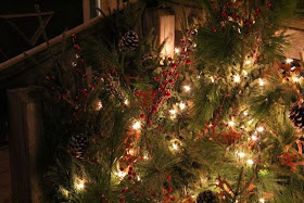 Christmas lights and greenery closeup