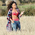 Smoking hot!  Rihanna puffs on a cigarette while filming her new video in the Northern Ireland countryside