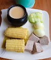 Nduma, Boiled Maize, Eggs, Cucumber, and White Coffee Tea: A Hearty Kenyan Breakfast Feast