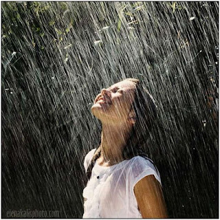 Lonely Girl Feeling Happy in the Rain