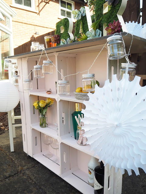 DIY tutorial for an outdoor bar using wooden crates, plus artificial grass bar letters to decorate. Perfect for summer BBQ's or garden parties. 