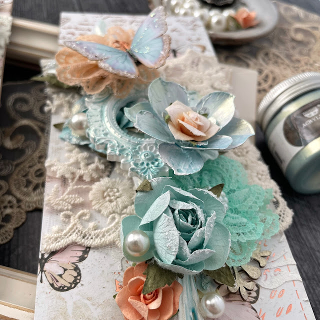 Mixed media panels created with: Prima Marketing apricot honey, peach tea, coffee break flowers, mechanicals grungy succulents, opal magic paint, moulds; Reneabouquets butterflies, glitter glass; Tim Holtz baubles