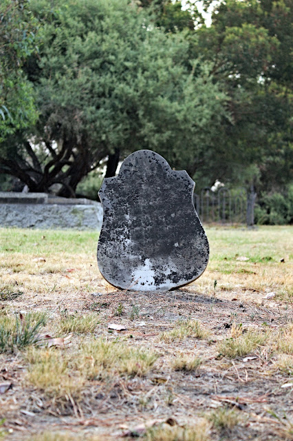 Image of an old grave with only a tombstone marking its location - cemetery photography