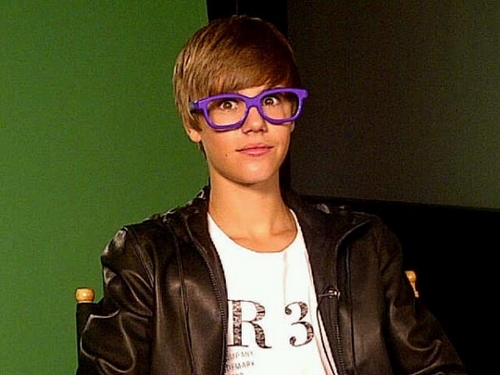 pictures of justin bieber with glasses on. justin bieber purple glasses.